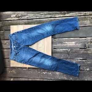 Levi’s 511 faded blue jeans.
